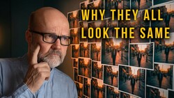 Photographer examining a grid of similar sunset street photographs pinned to a wall.